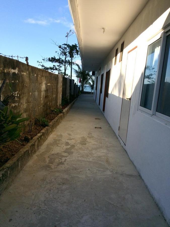 אל נידו Bucana Beachfront Guesthouse מראה חיצוני תמונה